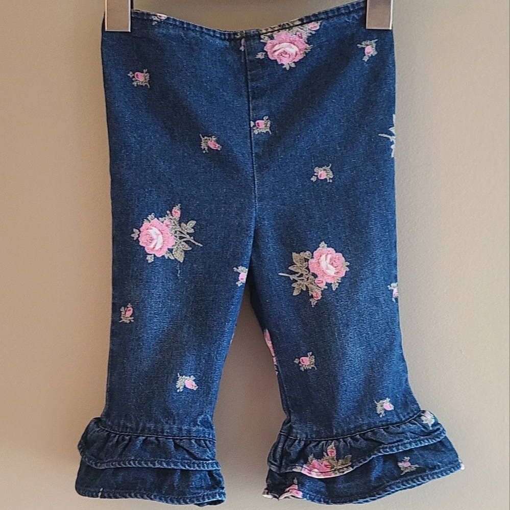 Baby denim jeans with floral print and ruffle bottoms